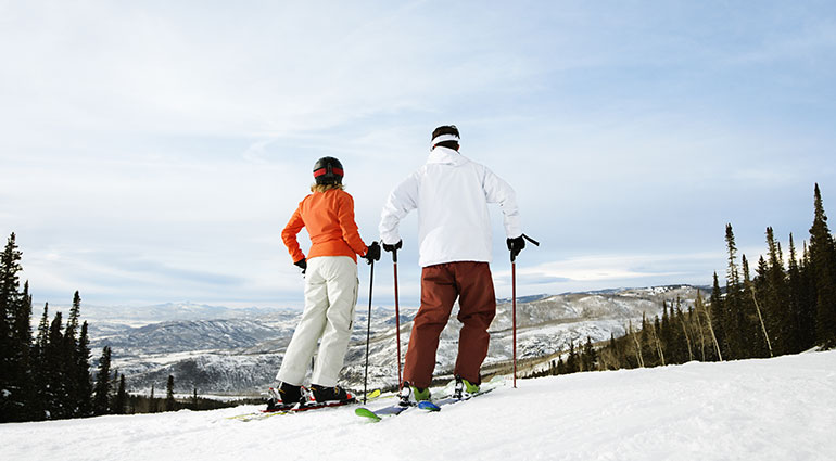 A couple skiing