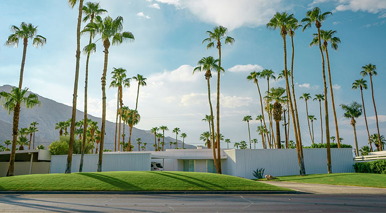 Midcentury building with Hollywood Hills in the background